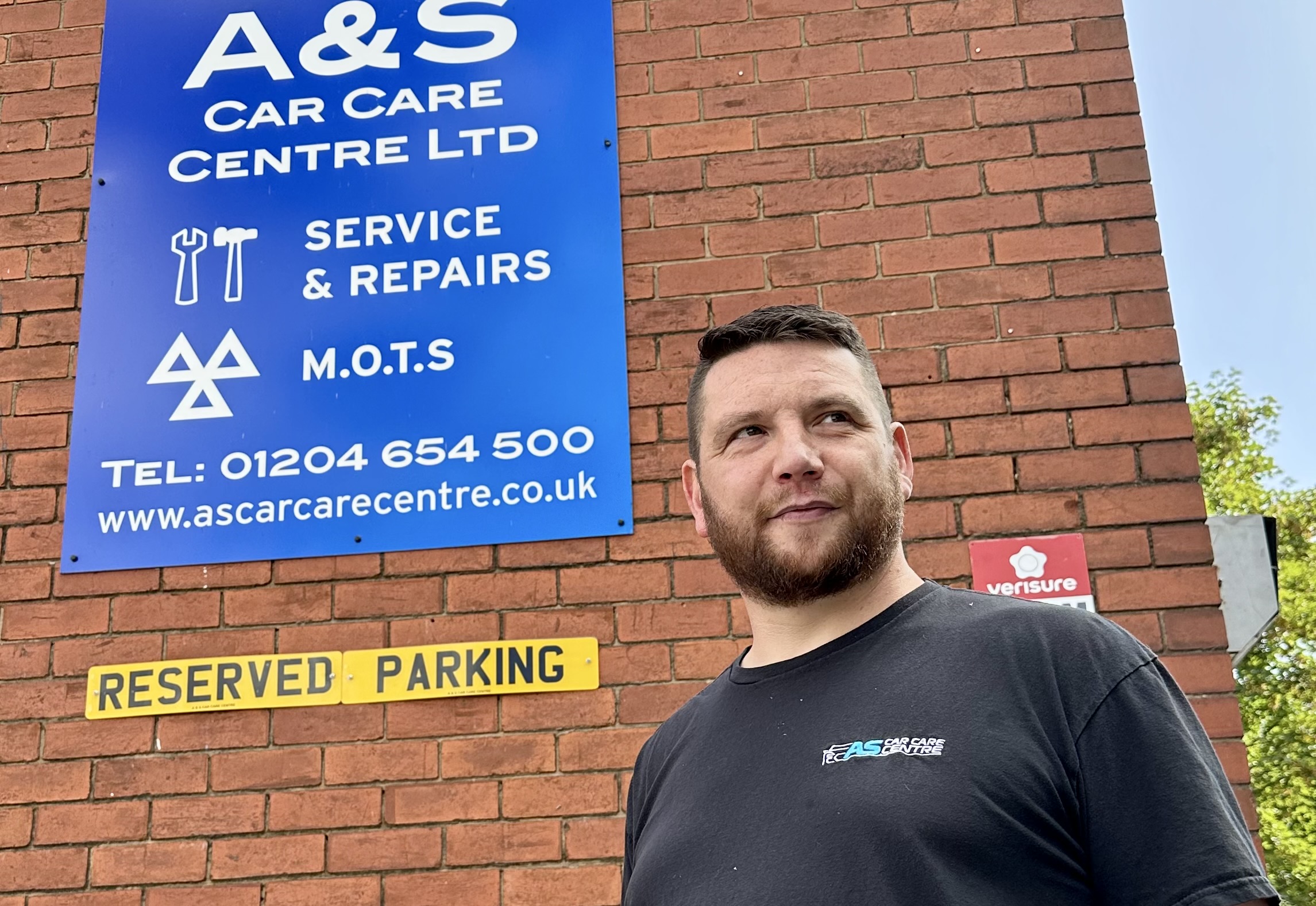 Image shows owner Mark Williams stood outside his garage - A&SCarCare - Profitable Work